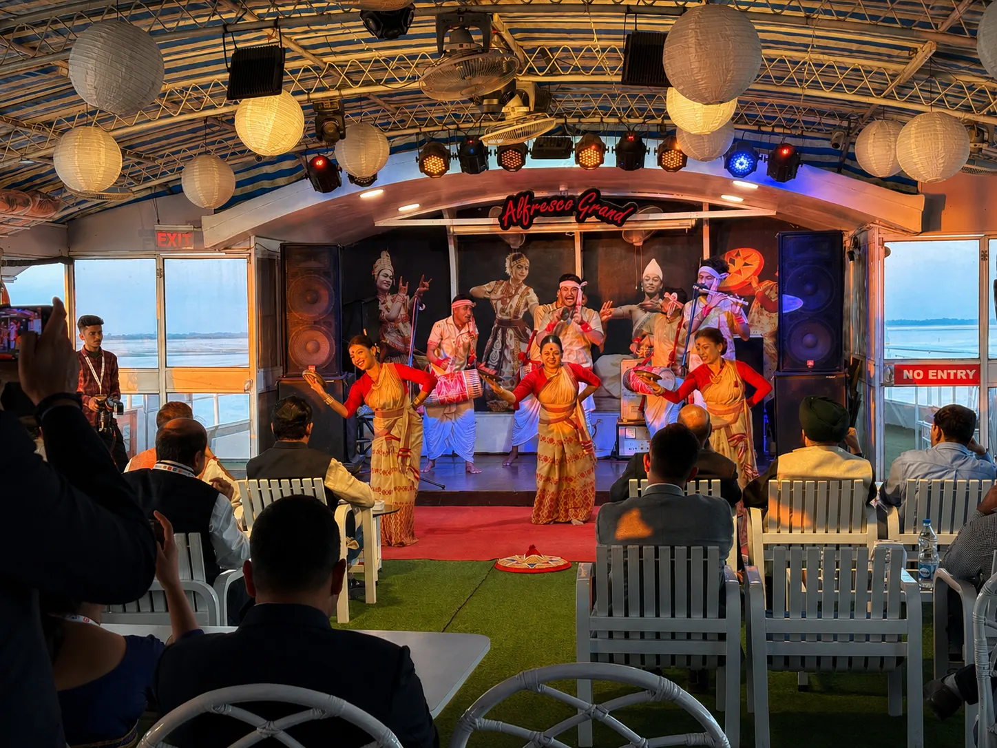 Bihu dancers performing on the Alfresco Grand stage for a private event audience
