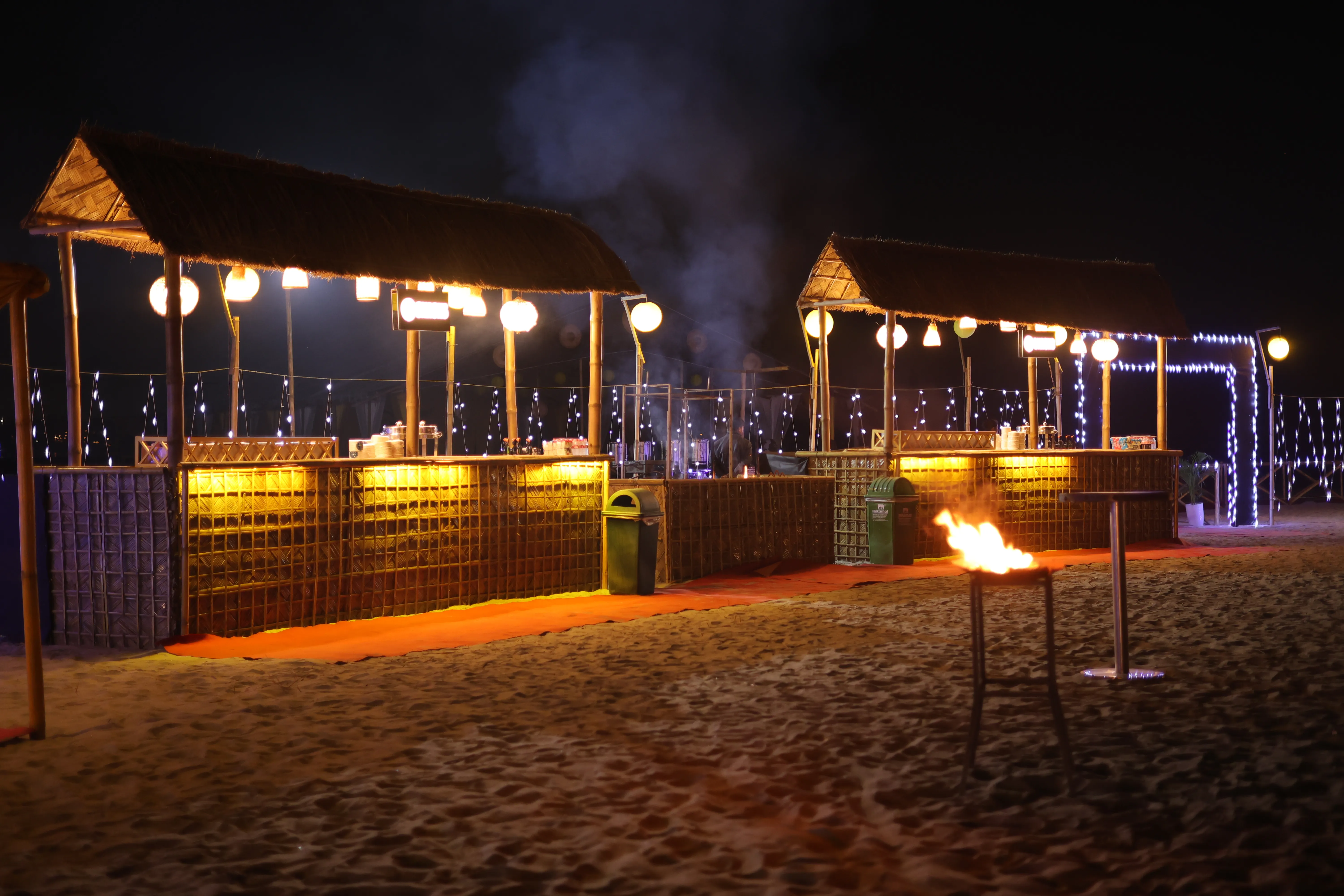 Live food stalls and bonfire at an island celebration
