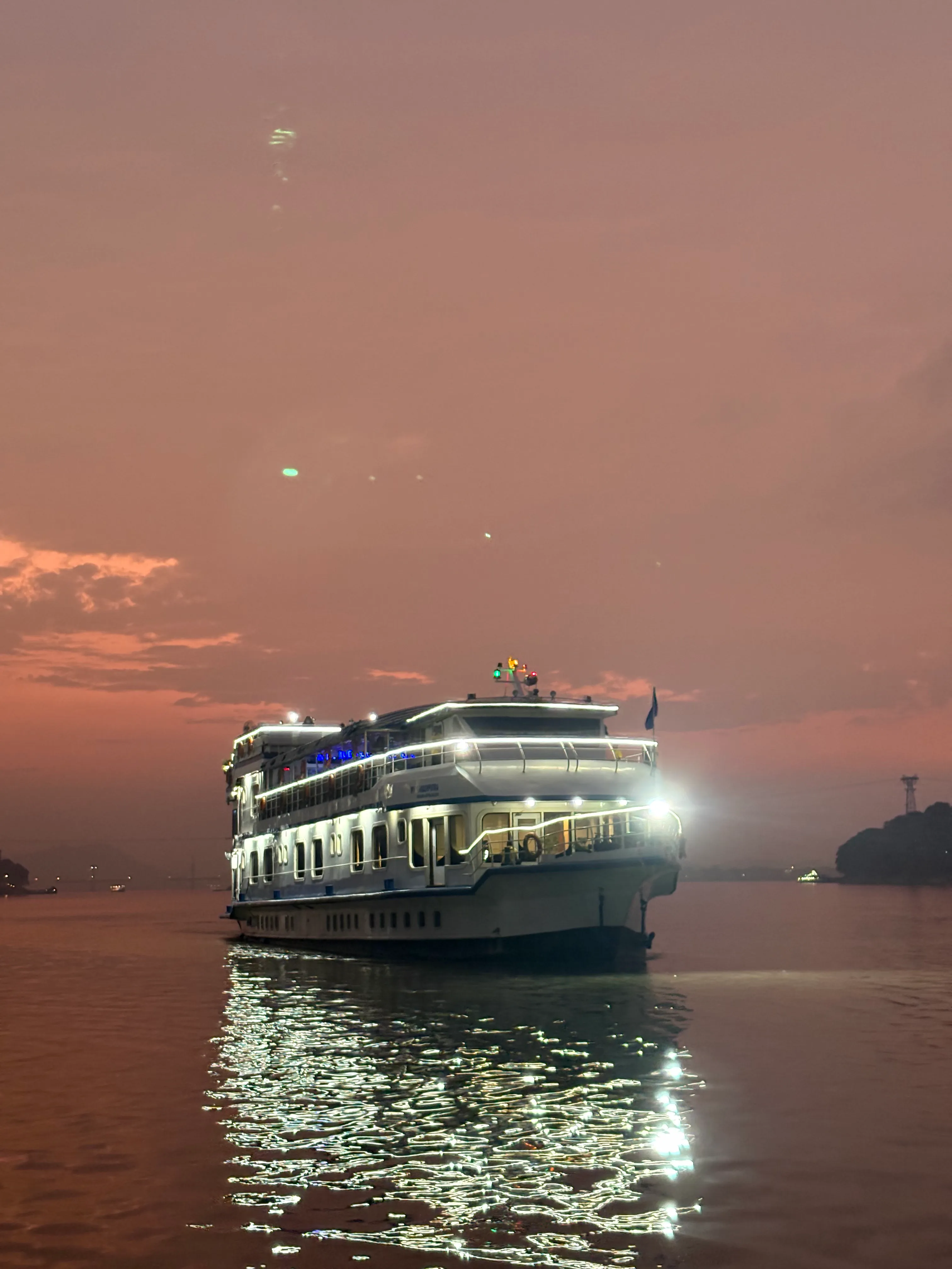 Alfresco Grand passing Umananda Island and the ropeway at golden hour